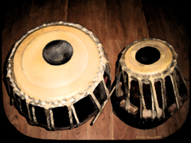 A pair of tabla drums on a wooden floor
